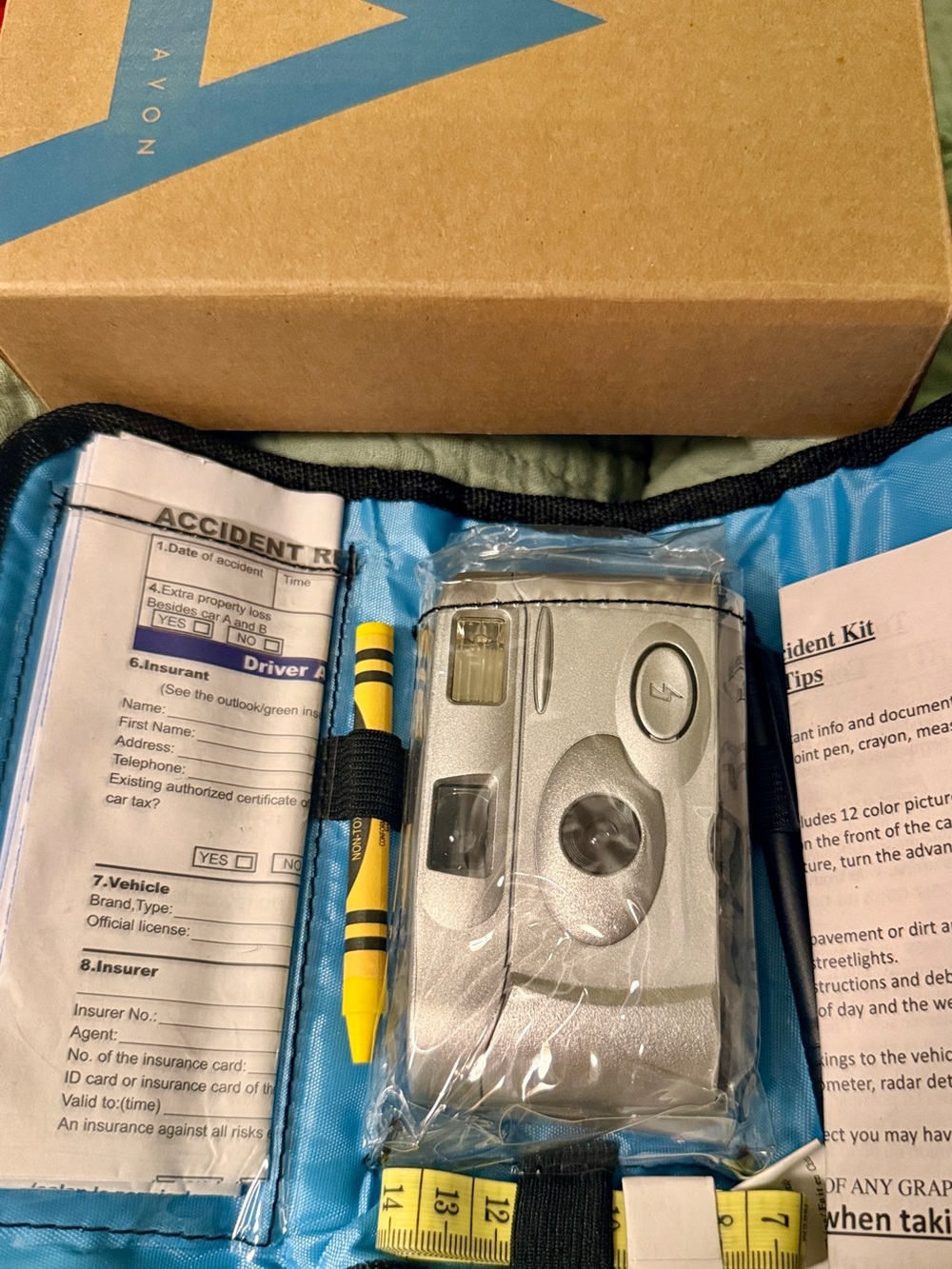 Car accident kit Avon camera measuring tape pen crayon